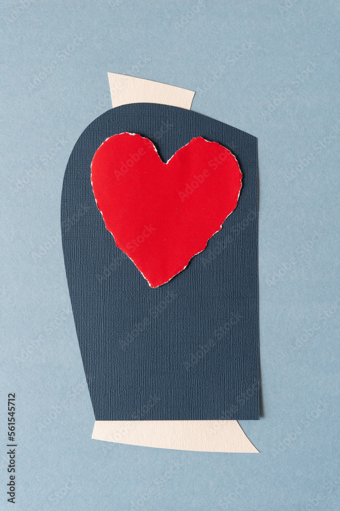 Canvas Prints old torn paper heart on textured blue paper