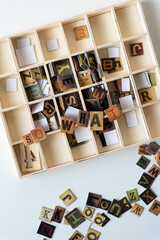 wooden box and chipboard tiles with vintage style letters