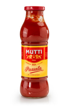 Parma, Italy - January 14, 2023: Mutti italian tomato puree in glass bottle isolated on white, with clipping path. Mutti is an important canning industry in Parma