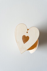 heart shaped wooden ornament on 3d paper object