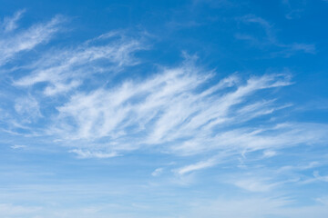 Cloudscape of white clouds in a blue sky