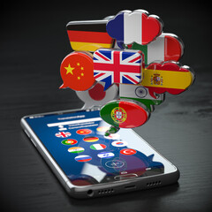 Global communication, dictionary, translating  and learning languages online app concept. Mobile smartphone and speech bubbles with flags.