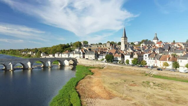 A sand dune in front of Charite sur Loire in Europe, France, Burgundy, Nievre, in summer, on a sunny day.