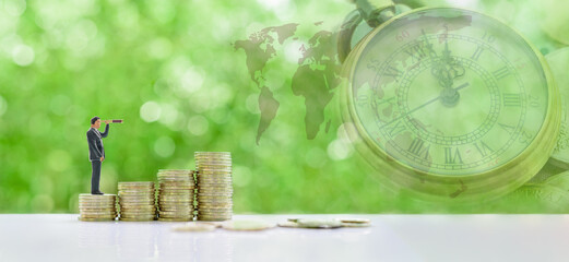 Seeking for sustainable growth, financial concept : Private investor searches through a monocular for potential future investment challenges and opportunities to increase profit in a tumultuous market