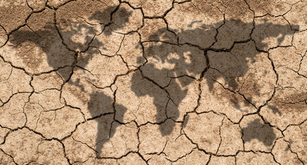 world map shadow and dry cracked land background