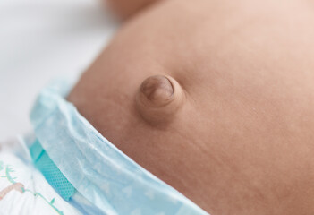 African american baby belly button at bedroom