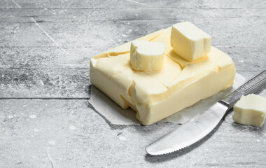 Butter on paper with a knife