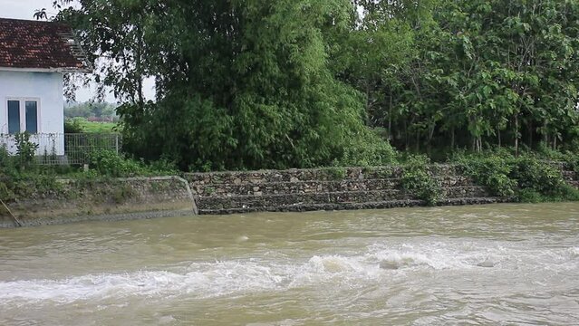 View of River Flows Flowing Fast During the Rainy Season
