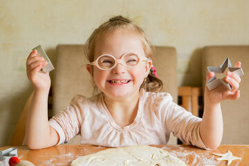Girl with Down Syndrome learns to roll dough