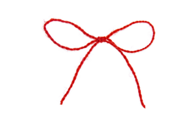 Red thread isolate on white background. Selective focus.