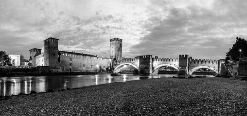Verona, Veneto, Italy: The medieval old castle on the banks of River Adige at night in black and white