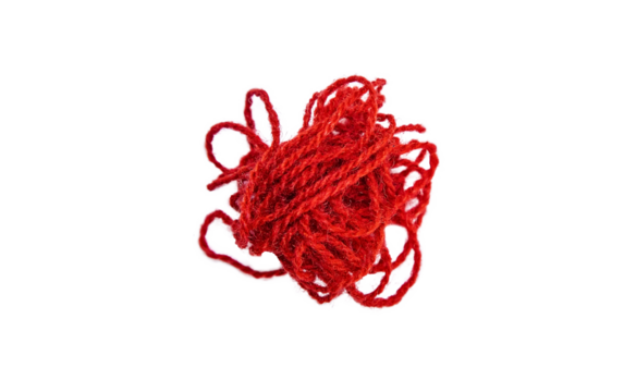 Red thread isolate on white background. Selective focus.