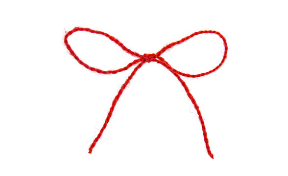 Red thread isolate on white background. Selective focus.
