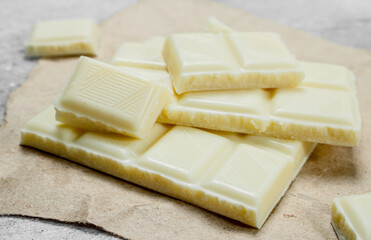 White chocolate on paper.