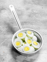 Boiled eggs in a saucepan.