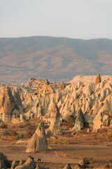 Stunning Cappadocia landscape with the rock formations during a beautiful sunset. Red & Rose...