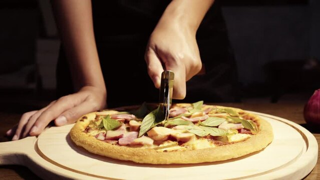 Close up homemade pizza on the table, fast food cooking in the kitchen at home, Food Fottage Clip.