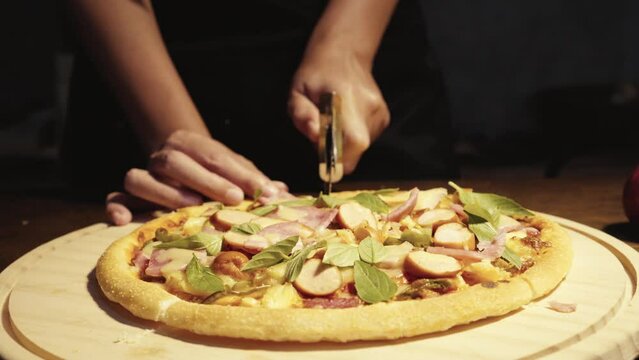 Close up homemade pizza on the table, fast food cooking in the kitchen at home, Food Fottage Clip.
