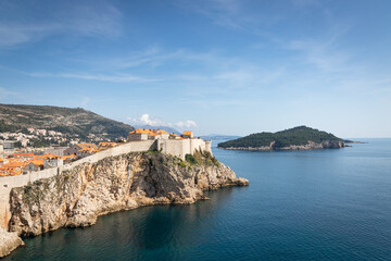 Fototapeta na wymiar Stony walls of Dubrovnik panorama captured on a sunny day. Dubrovnik, Croatia, Europe.