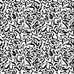 Abstract hand drawn flowers seamless pattern. Graphic brush drawn botanical pattern. Small leaves and flower petals. Camomile or daisy painted by brush. Black silhouettes of spring chrysanthemums.