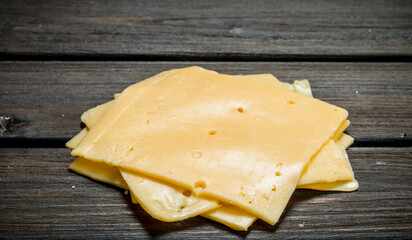 Thin slices of cheese.