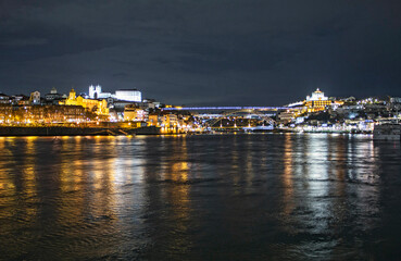 Fototapeta na wymiar Night image of Porto, river and reflections, Portugal