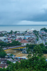 Fototapeta premium Photograph of Muara Padang harbour, taken from Siti Nurbaya bridge. West Sumatera of Indonesia