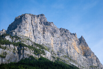 Fototapeta na wymiar Pointed peaks in the valley of Lauterbrunnen