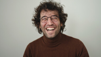 Young hispanic man smiling confident standing over isolated white background