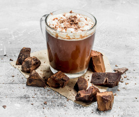 Hot chocolate with chunks of bitter chocolate and marshmallows.