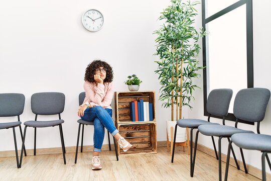 Young middle east woman desperate sitting on chair at waiting room