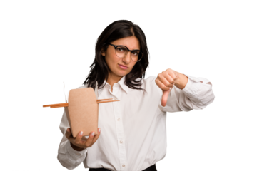 Young business indian woman eating takeaway noodles cut out isolated showing a dislike gesture, thumbs down. Disagreement concept.
