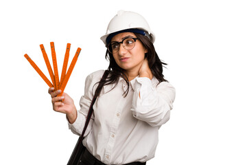 Young architect indian woman with helmet and holding a meter cut out isolated touching back of head, thinking and making a choice.