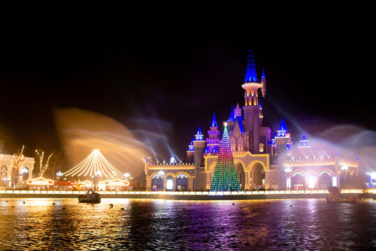 Tashkent, Uzbekistan - January 7, 2023: "Magic City" amusement park on a late evening. Fairy tale