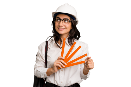 Young architect indian woman with helmet and holding a meter cut out isolated