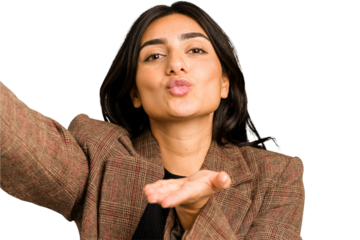 Young indian woman doing a selfie with mobile isolated