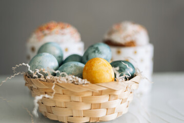 Easter cakes, eggs and the letters Christ is Risen on the table. Orthodox Christians.