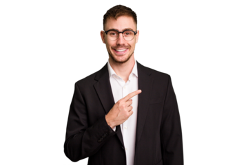 Young caucasian business man cutout isolated smiling and pointing aside, showing something at blank space.