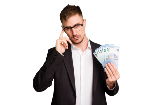 Young business caucasian man holding euro banknotes isolated cut out pointing temple with finger, thinking, focused on a task.