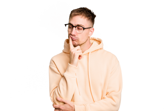 Young caucasian man cut out isolated looking sideways with doubtful and skeptical expression.