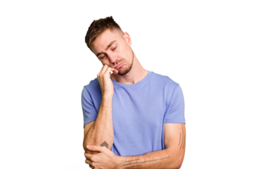 Young caucasian man cut out isolated tired of a repetitive task.