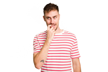 Young caucasian man cut out isolated relaxed thinking about something looking at a copy space.