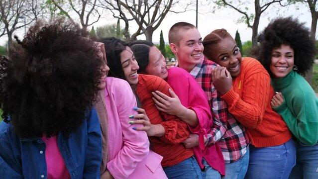 Group of women from different cultures having fun together outdoors - lifestyle concept, multiculturalism