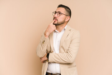 Adult latin business man cut out isolated looking sideways with doubtful and skeptical expression. - obrazy, fototapety, plakaty