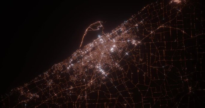 Erie (Pennsylvania, USA) aerial view at night. Top view on modern city with glow effect. Camera is zooming out, rotating counterclockwise