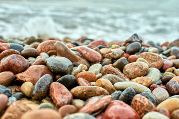 Stones lie on the beach of Zelenogradsk, Baltic Sea.