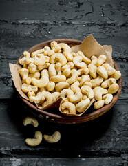 Cashew nuts in bowl .