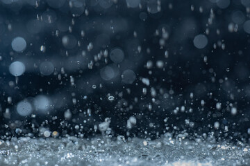 Macro photography of rain on a black background. Abstract background.