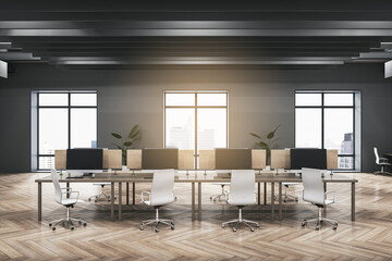 Contemporary dark concrete and wooden coworking office interior with furniture, equipment, window with city view and sunlight. Workplace and loft space concept. 3D Rendering.