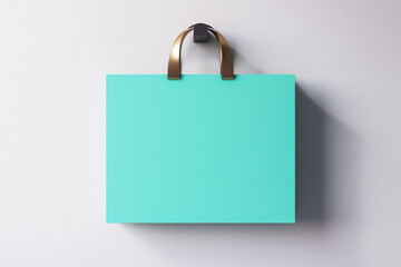 Close up of blue shopping or present bag on light background. Mock up, 3D Rendering.